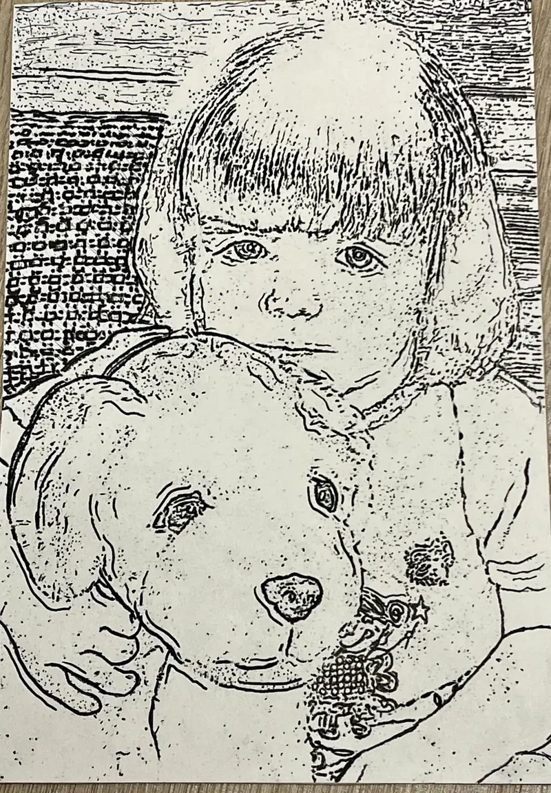 Black and white line print of the toddler hugging the toy dog.